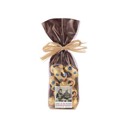 Sachet d'oeufs en chocolat au lait  fourré praliné noisette